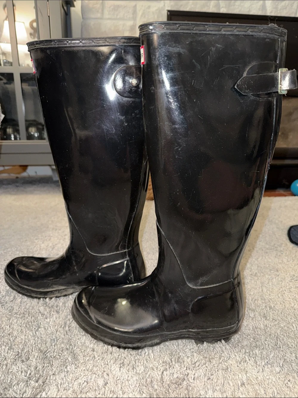 Hunter glossy tall black boots w/ cream sock insert. Collegiate waterproof cozy